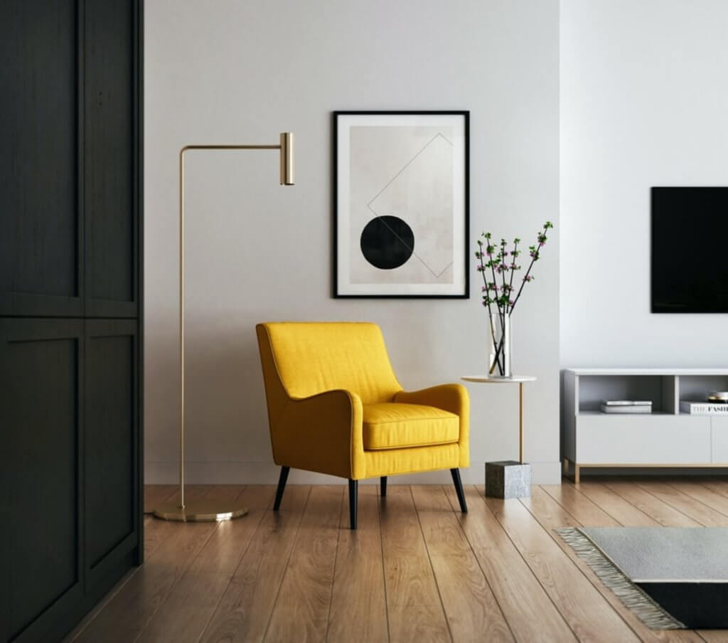 A yellow chair in a room
