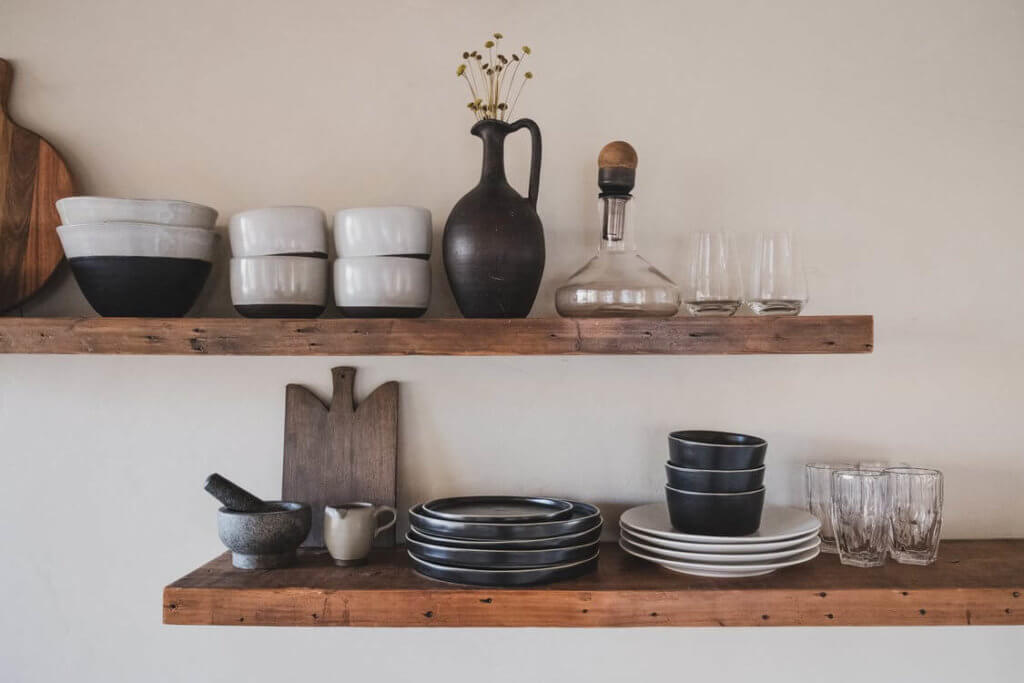 A shelf with kitchen items