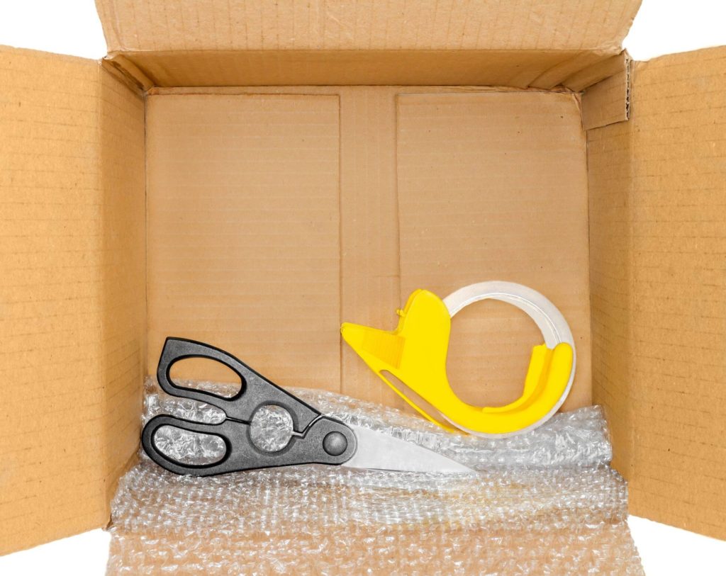 a box with tools and wrap
