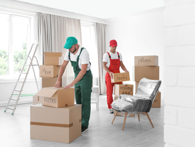 Long-distance moving company packing belongings