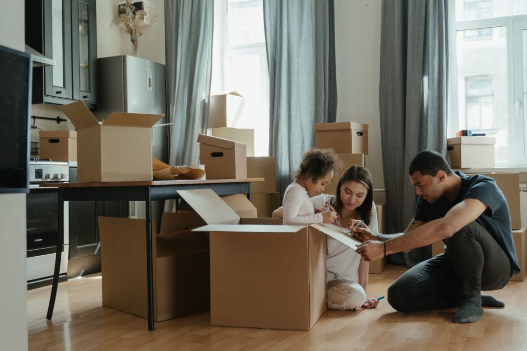 Family unpacking after long-distance moving