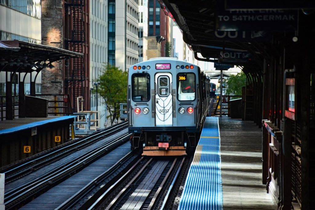 a view of Chicago's L-train on a station.