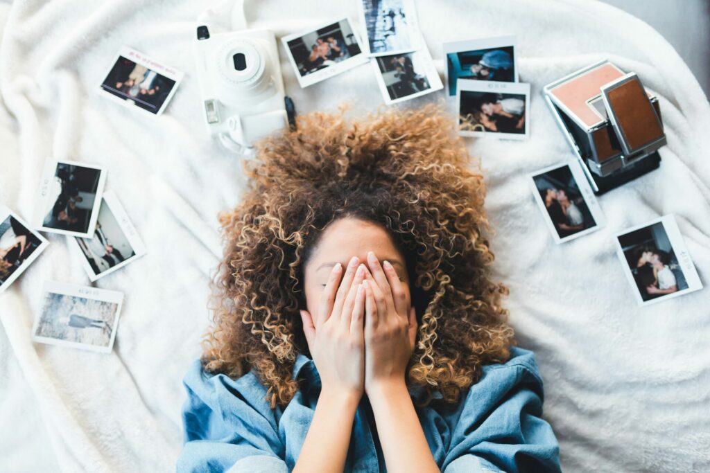 A woman surrounded by photos
