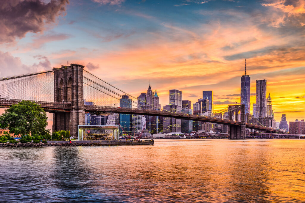 anhattan skyline viewed from the river at sunset
