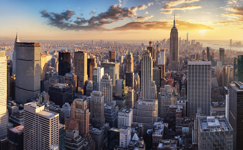 A Manhattan street filled with high-rise buildings