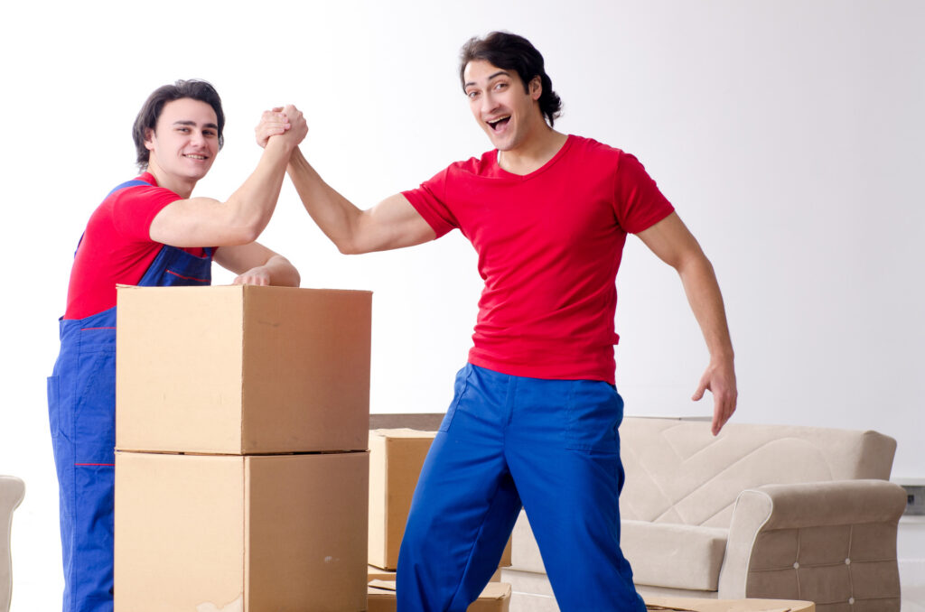 Professional Manhattan movers unpacking belongings