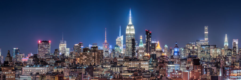 Night view of Manhattan skyline where you need moving insurance